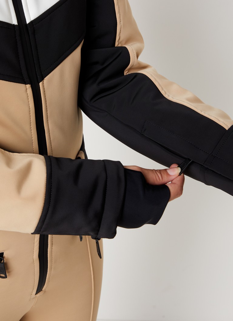 NIKKIE Uriel flared fit ski suit with logo and belt