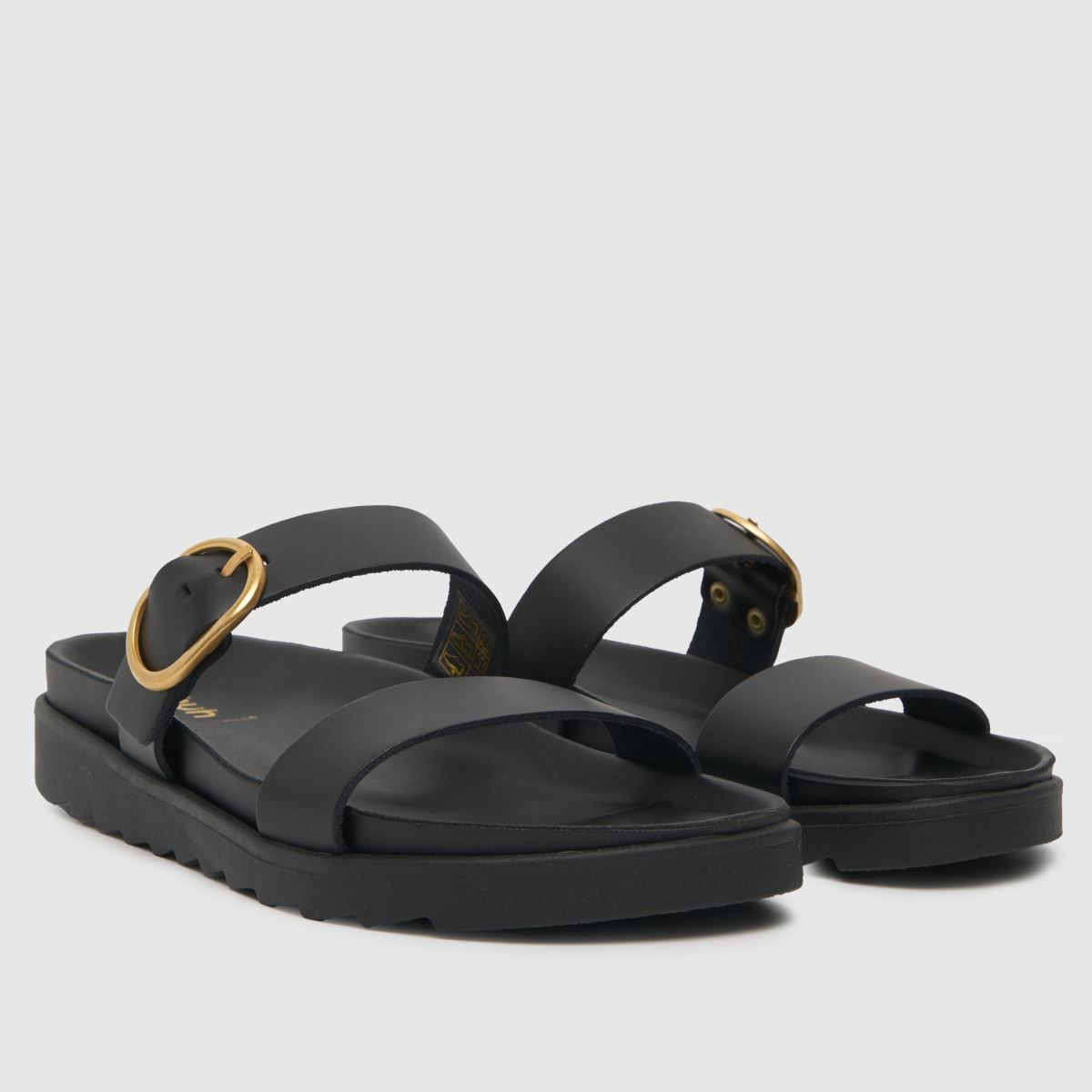 Schuh teddy bőr csatos talpú szandál fekete színben