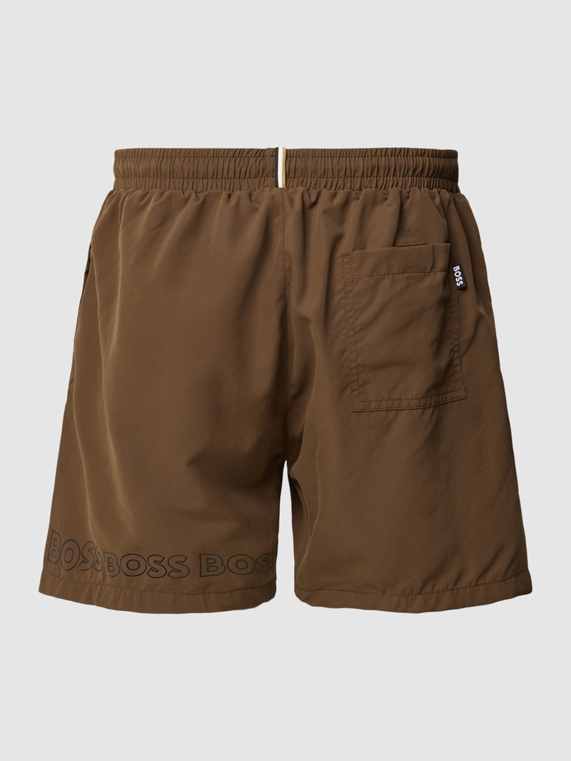 Badehose mit Label-Print Modell 'Dolphin' in olivgrün