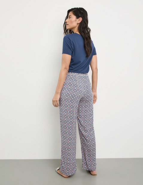 Fließende Hose mit Allover-Muster