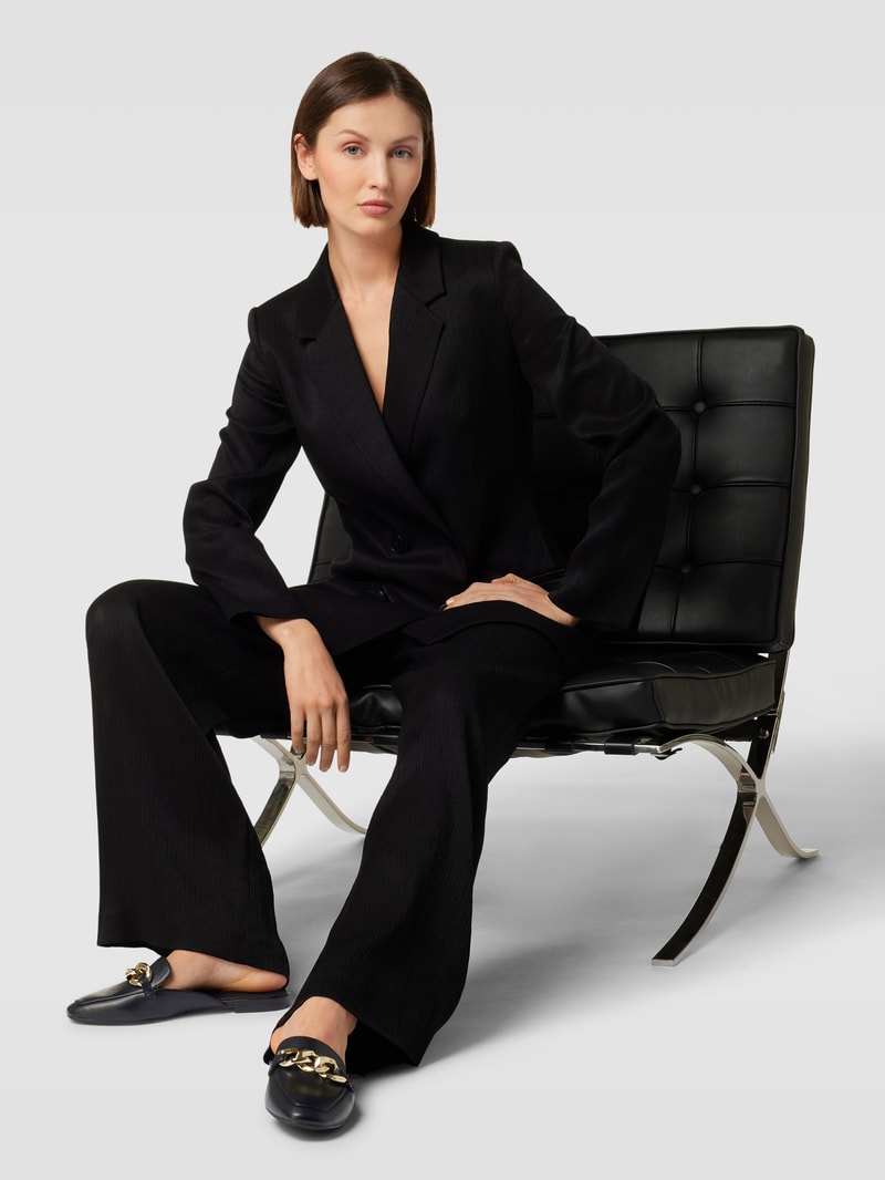 Pantoletten mit Zierkette in schwarz