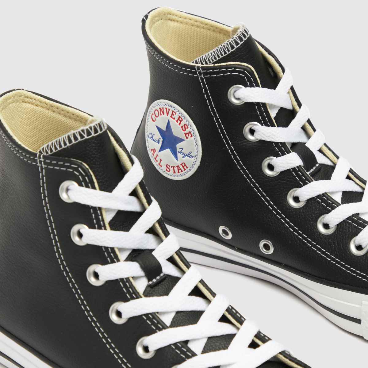 Converse All Star – Svarta och vita höga sneakers i läder