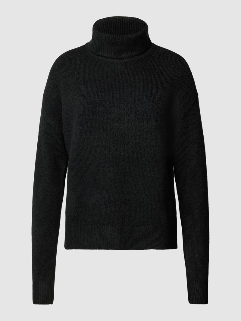 Rollkragenpullover mit überschnittenen Schultern in schwarz