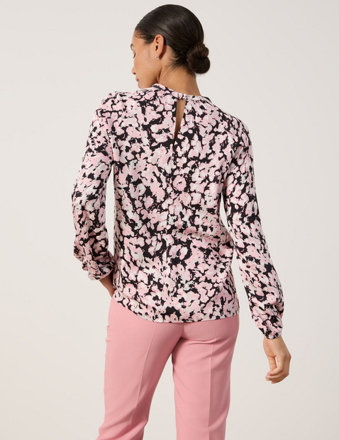 Bluse mit Ausschnittschlitzen