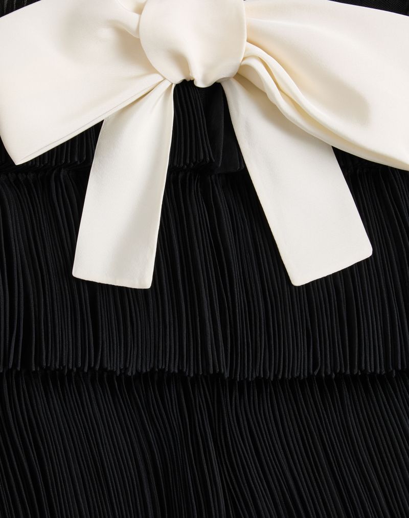 Capa de organza bordada