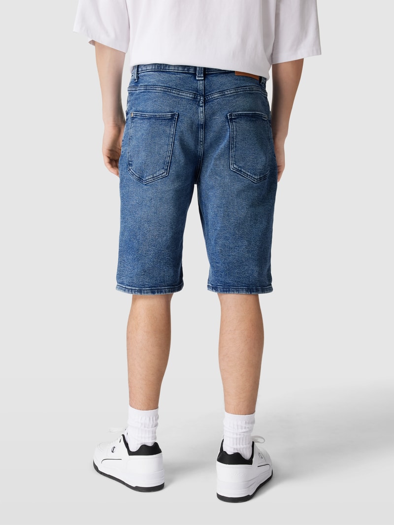 Jeansshorts im Destroyed-Look in blau