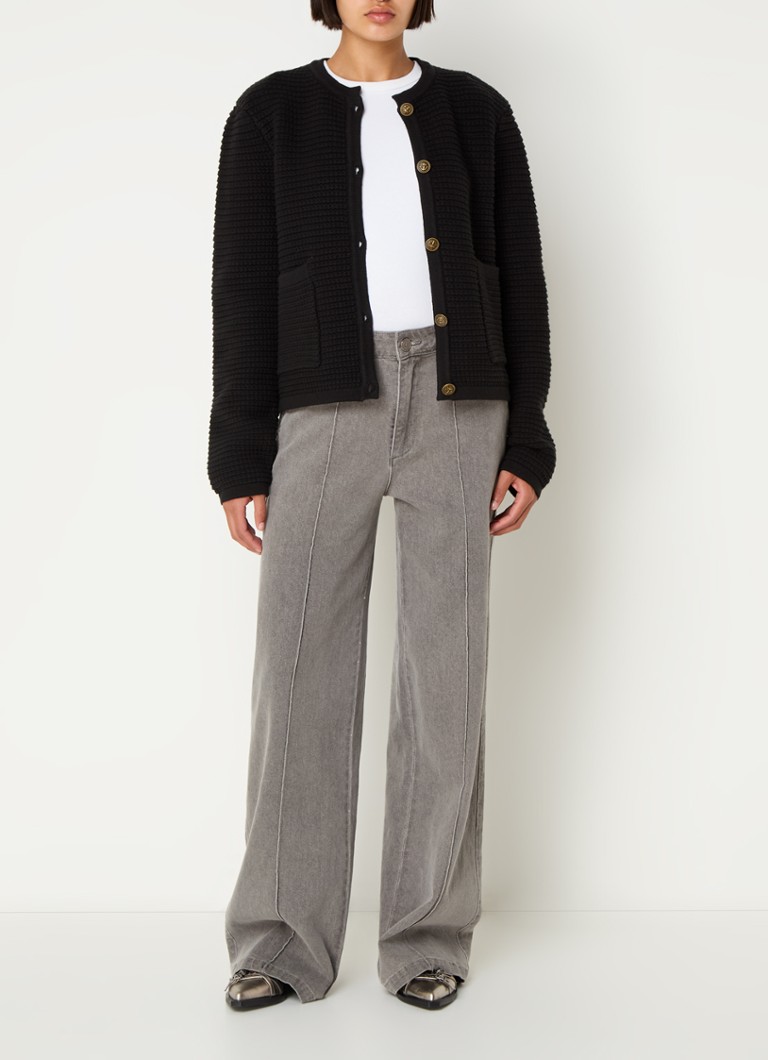 Cardigan gros tricotat de Sofie Schnoor, cu buzunare aplicate.