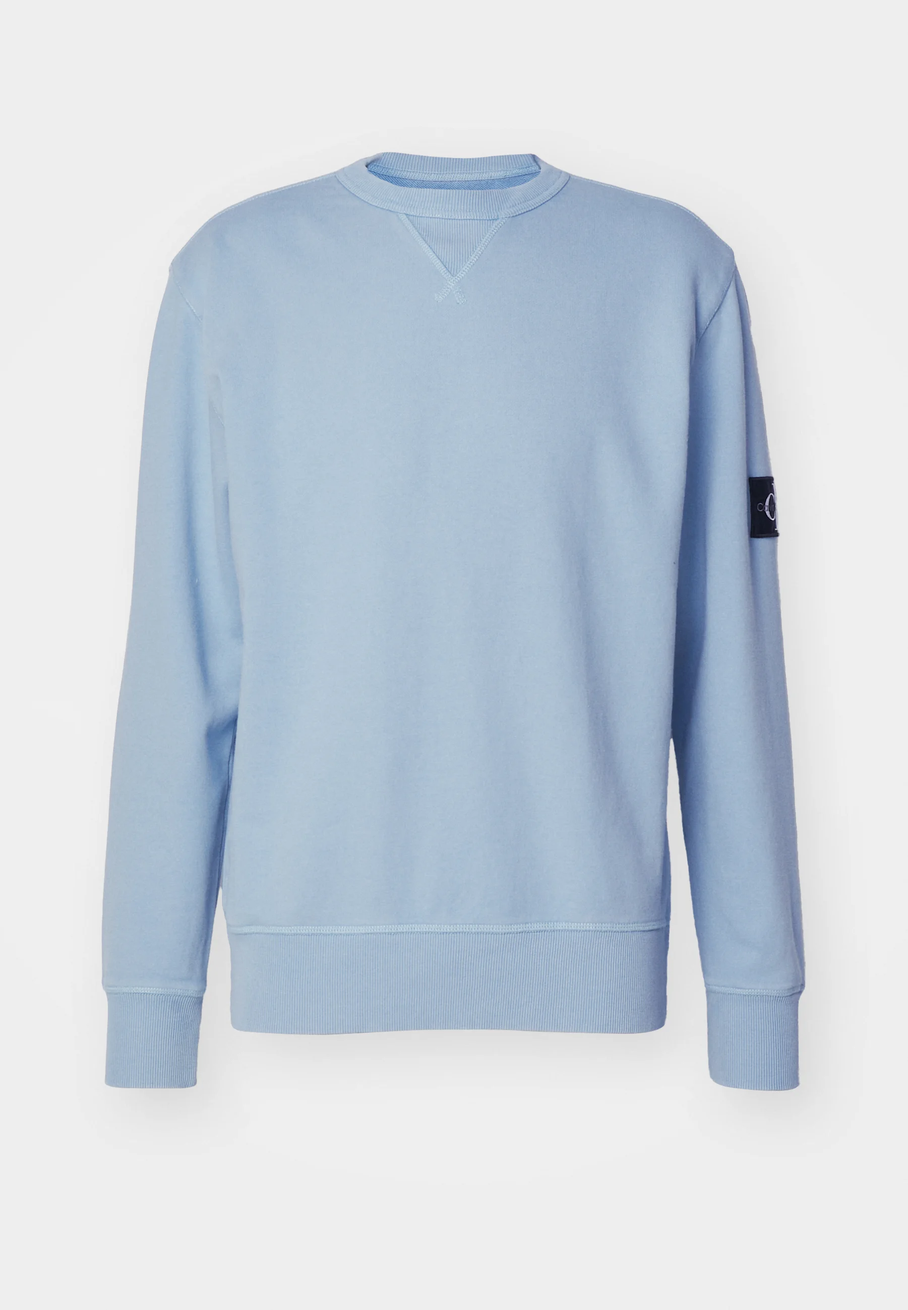 Sudadera unisex de cuello redondo con insignia lavada de Calvin Klein Jeans
