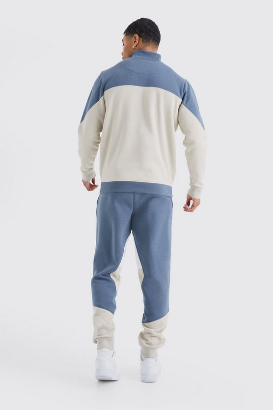 Man Colorblock Trainingsanzug mit 1/4 Reißverschluss und Trichterkragen