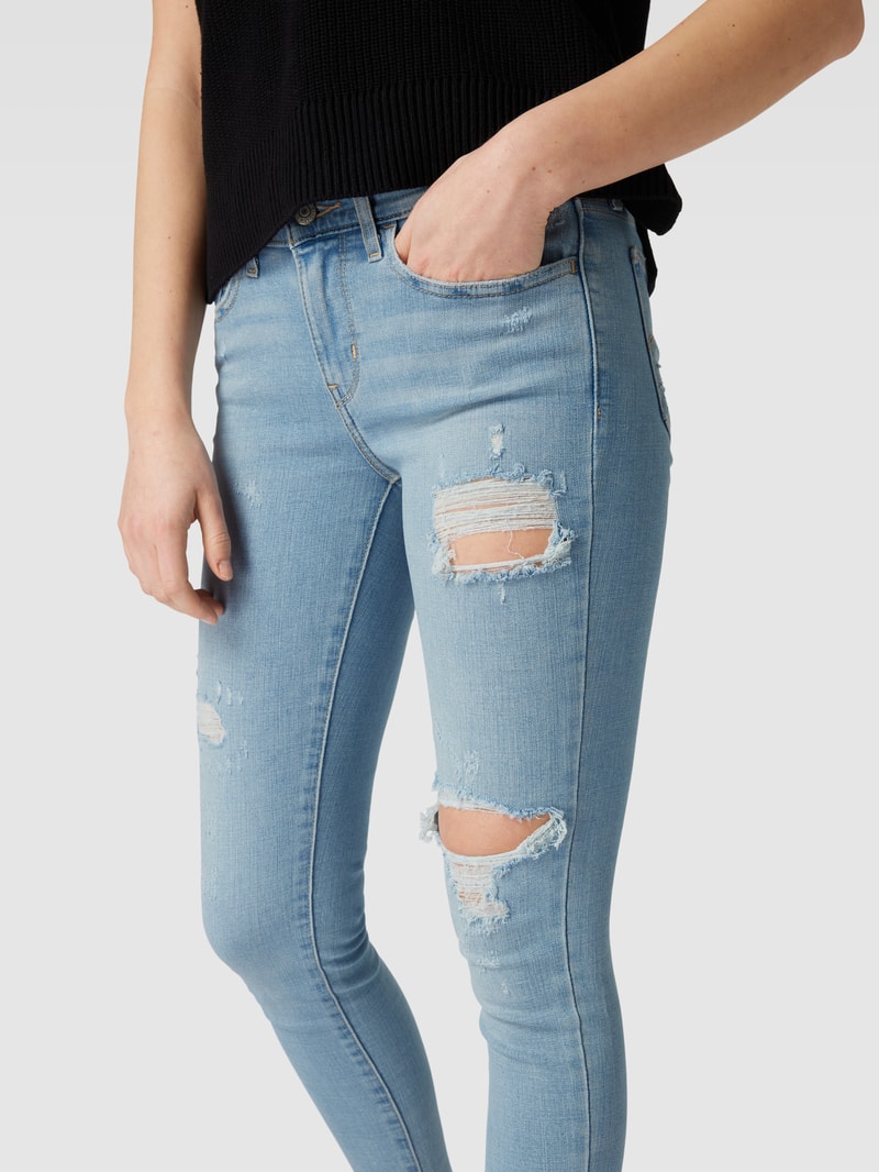 Super Skinny Fit Jeans mit Destroyed-Details Modell '710' in hellblau