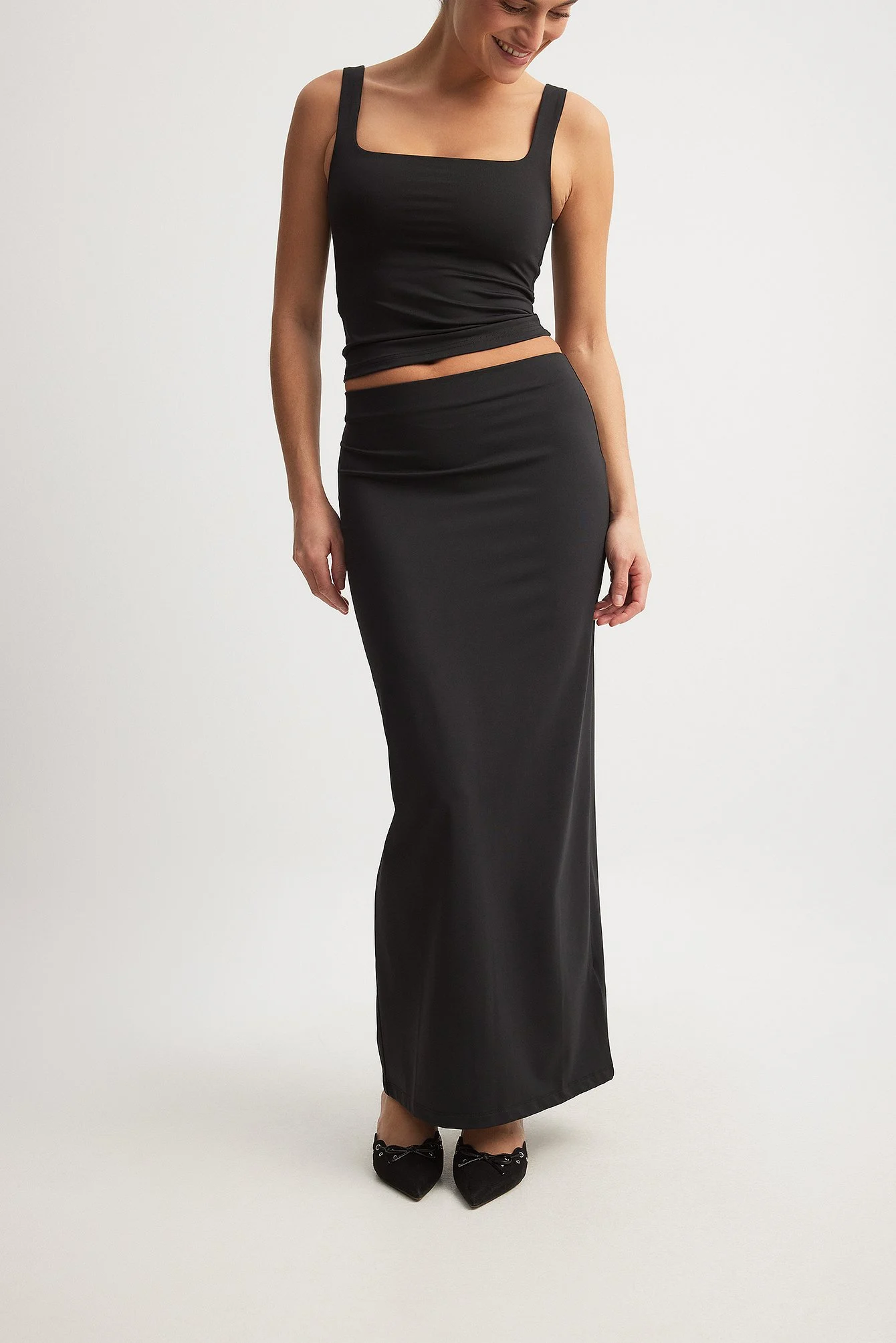 Eng anliegender Rock mit niedriger Taille