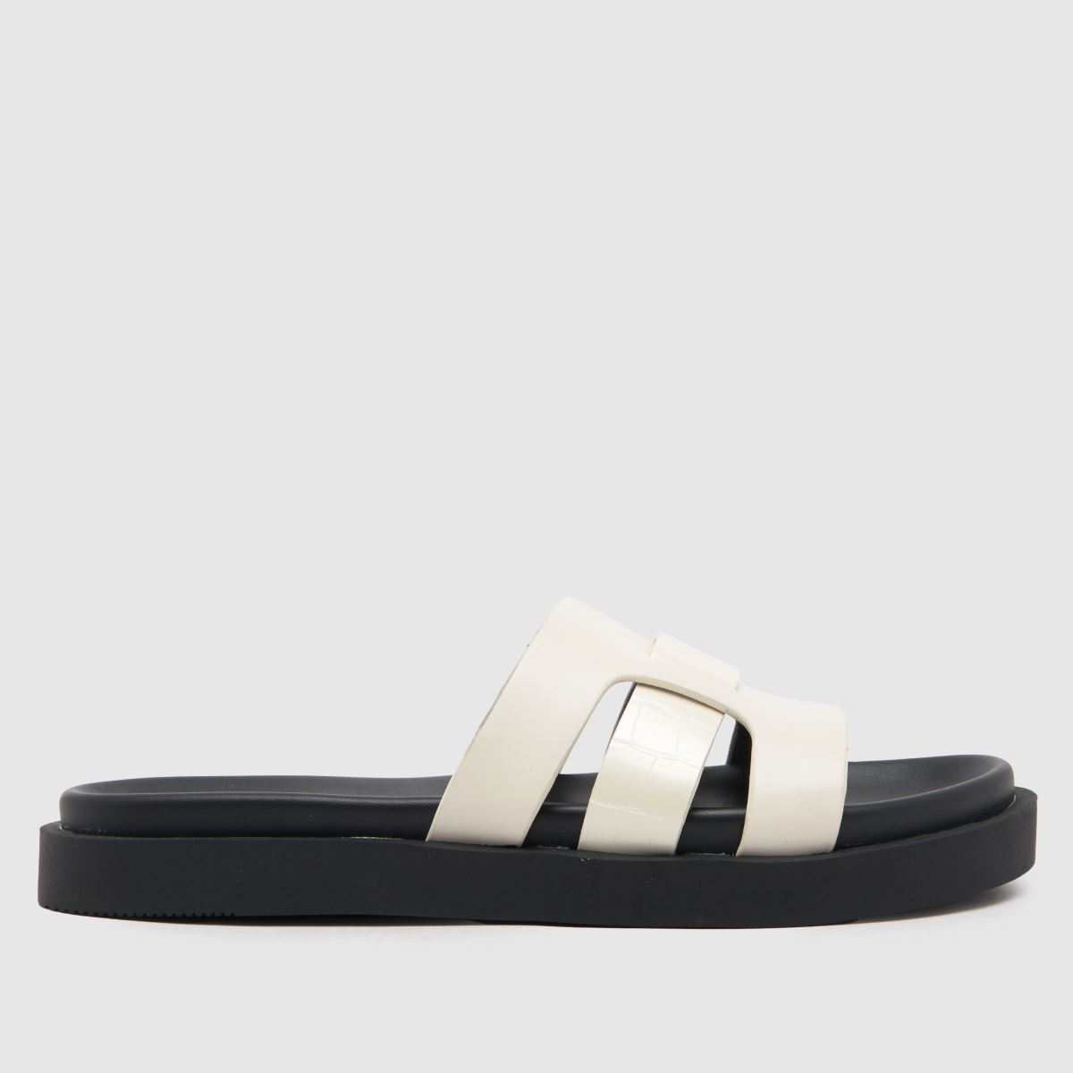 Schuh Timmy Crocs talpbetétes szandál törtfehér színben