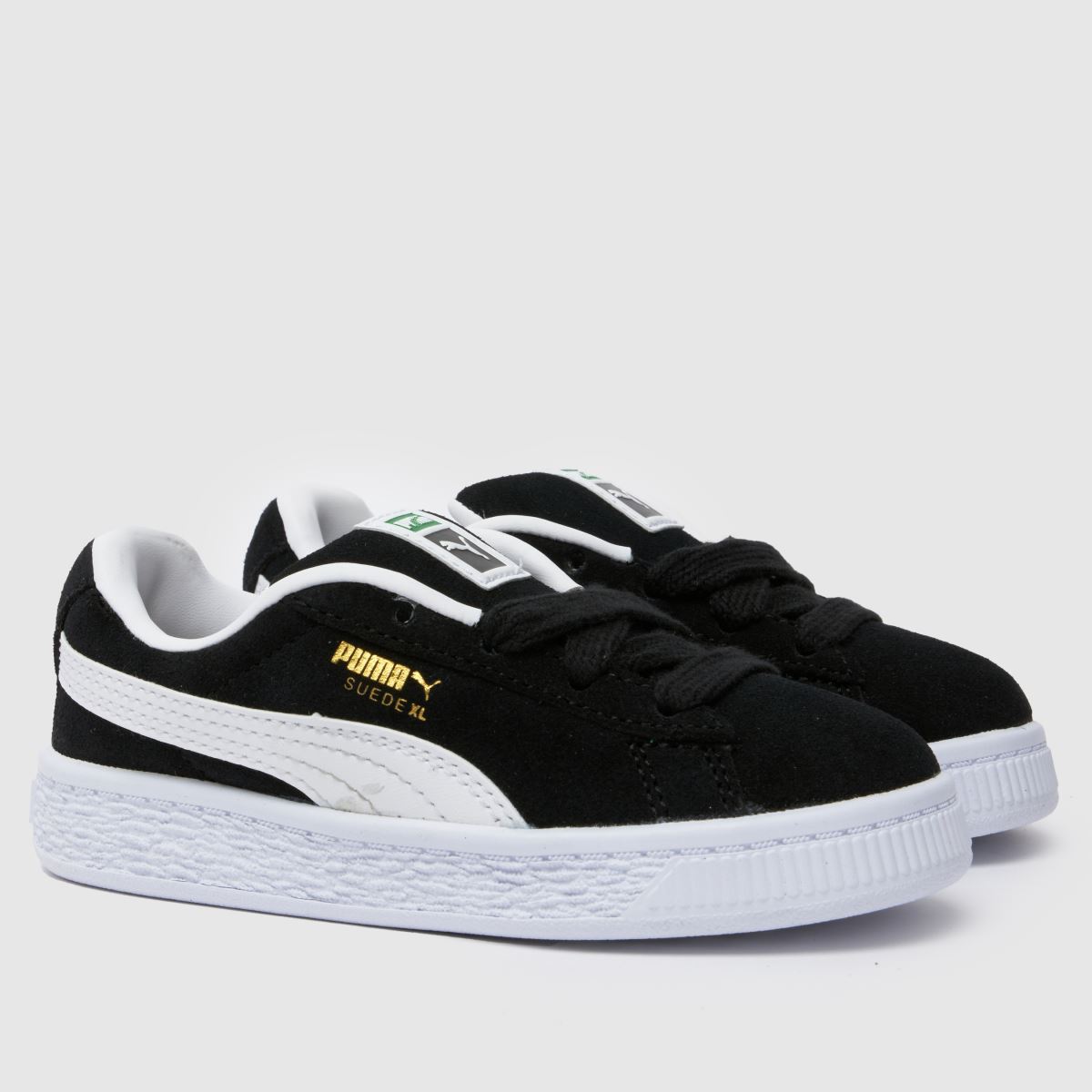 PUMA svarta och vita mocka XL småbarnssneakers