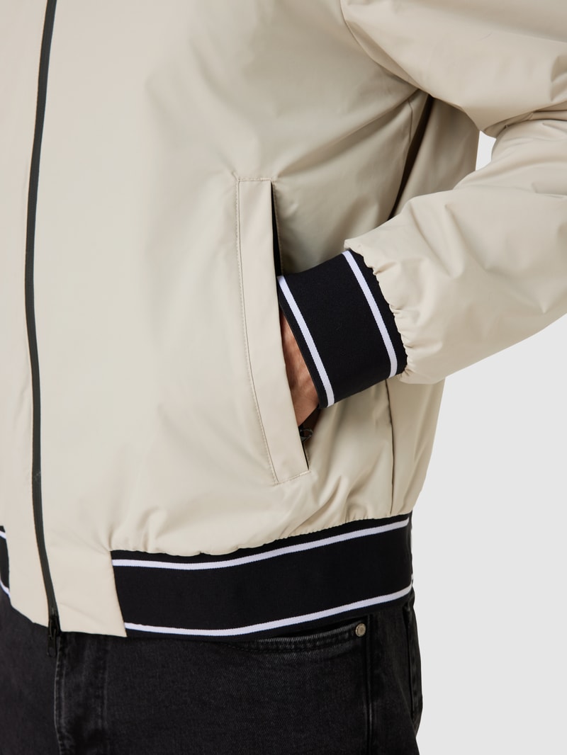 Blouson mit Stehkragen und Zweiwege-Reißverschluss in beige