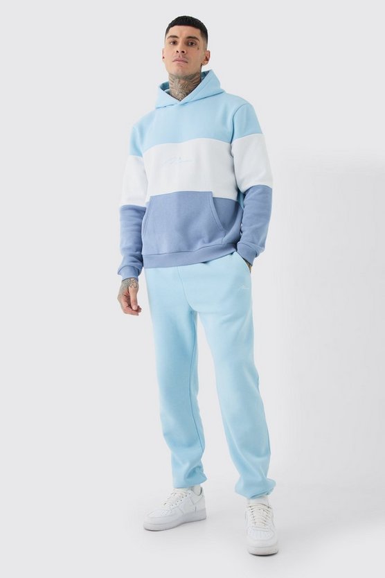 Tall hellblauer Colorblock Man Trainingsanzug mit Kapuze
