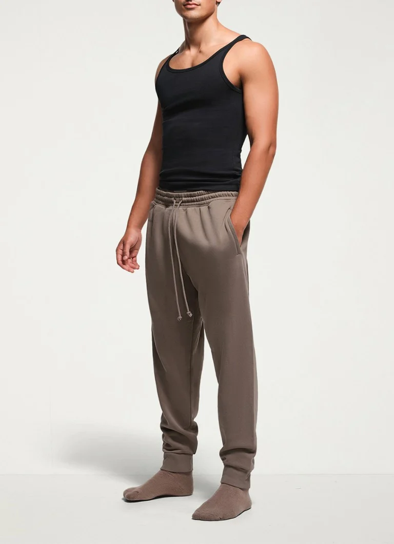 Pantaloni de trening din fleece SKIMS, cu croială slim și buzunare laterale.
