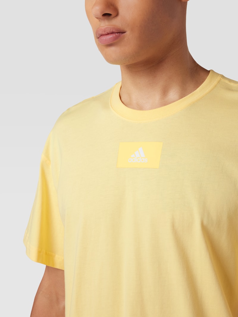 T-Shirt mit Logo-Print in gelb