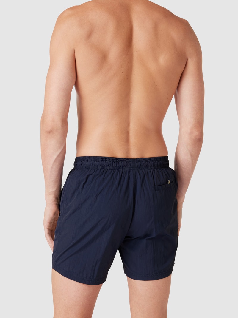 Badehose mit Label-Print Modell 'Octopus' in dunkelblau