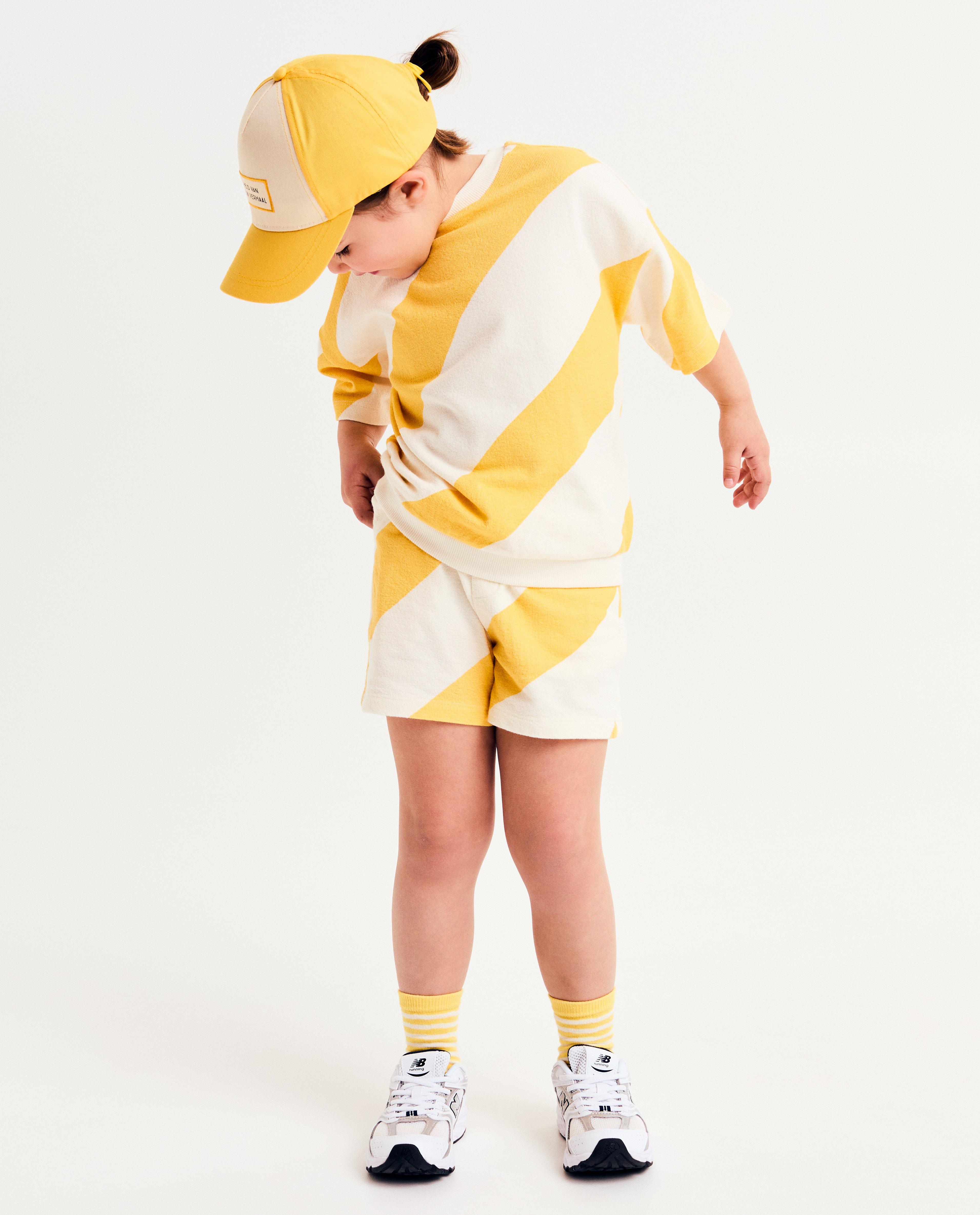 Elisabeth Lucie Baeten csíkos pulóver, unisex sárga