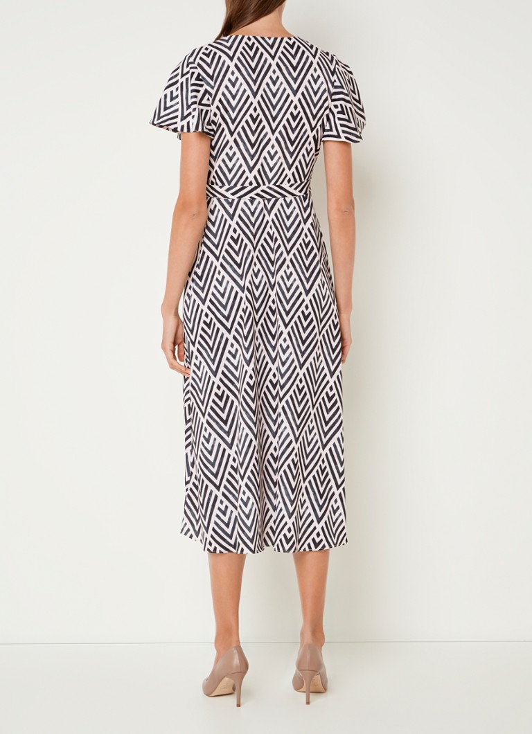 El vestido midi cruzado Julissa de Phase Eight presenta un estampado gráfico y un bajo asimétrico.