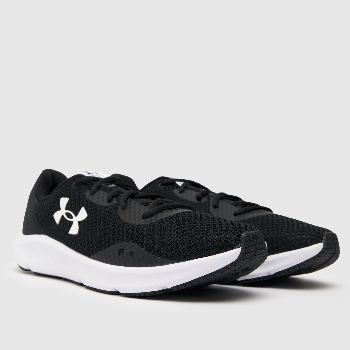 Under Armour – Charged Pursuit 3 – Svarta och vita träningsskor