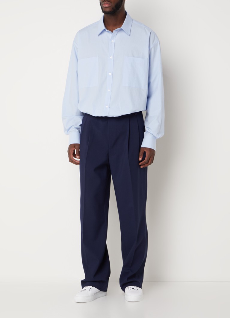 Camisa oversized Gus da Frankie Shop com bolsos no peito.