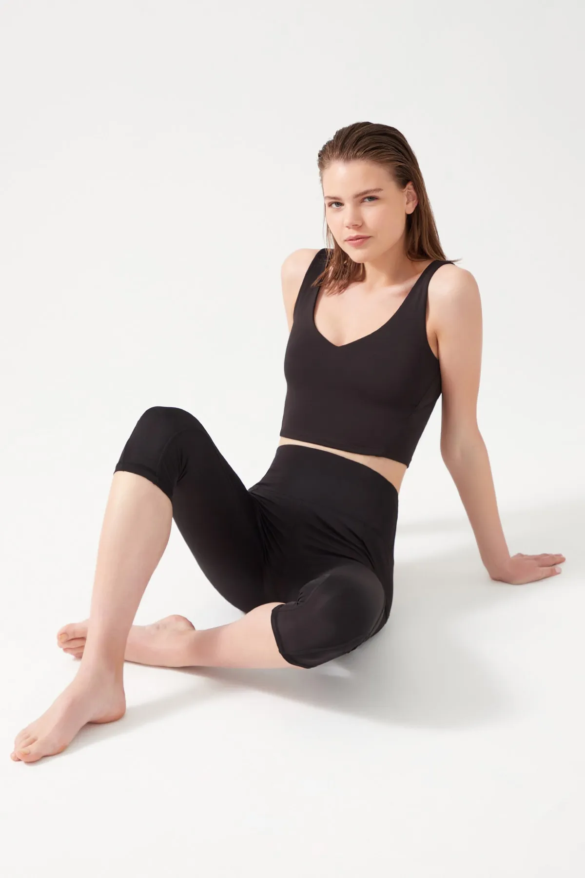 LOS OJOS  Schwarze Damen-Capri-Leggings mit hoher Taille und doppelter Tasche unterhalb des Knies