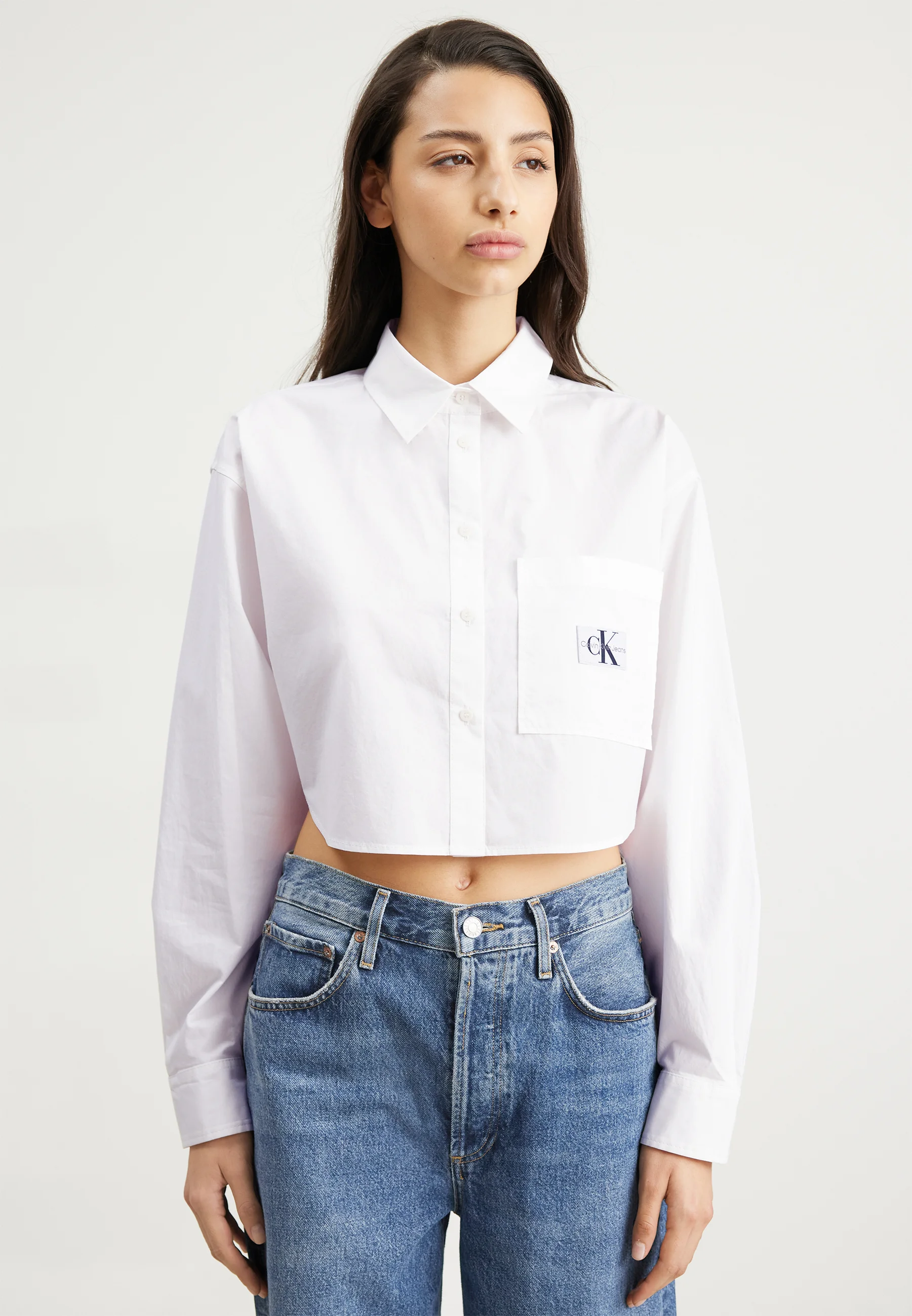 Calvin Klein Jeans Blusa recortada con etiqueta tejida