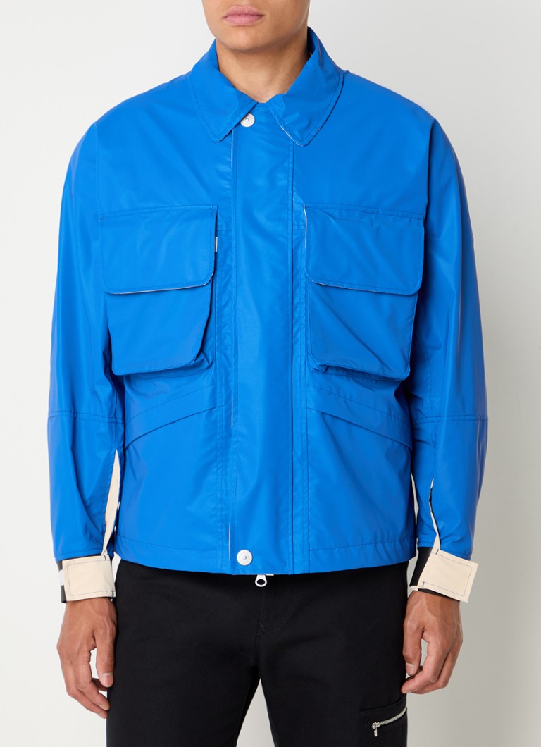 Vjetrovka Stone Island 445X2 s džepovima na preklop i printom logotipa