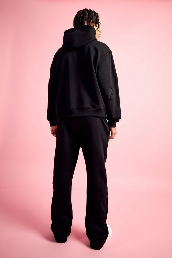 Kastiger Oversize Trainingsanzug mit Herz-Applikation