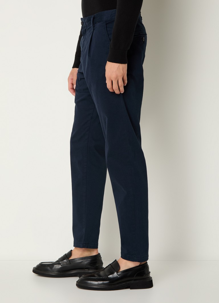 Pantaloni slim fit Ron da uomo selezionati, en misto cotone biologico con tasche laterali.