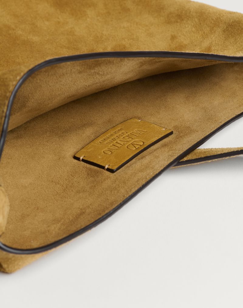 Bolsa de ombro Valentino Garavani Nellcôte em camurça com franjas