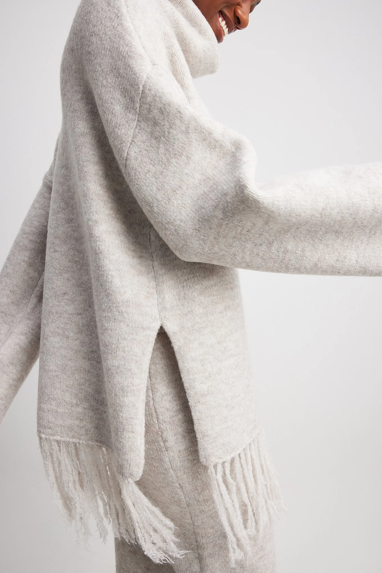 Rollkragenpullover aus Strick mit Fransen