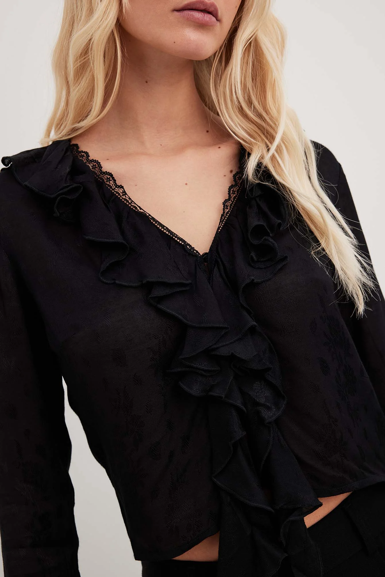 Spitzendetail-Top