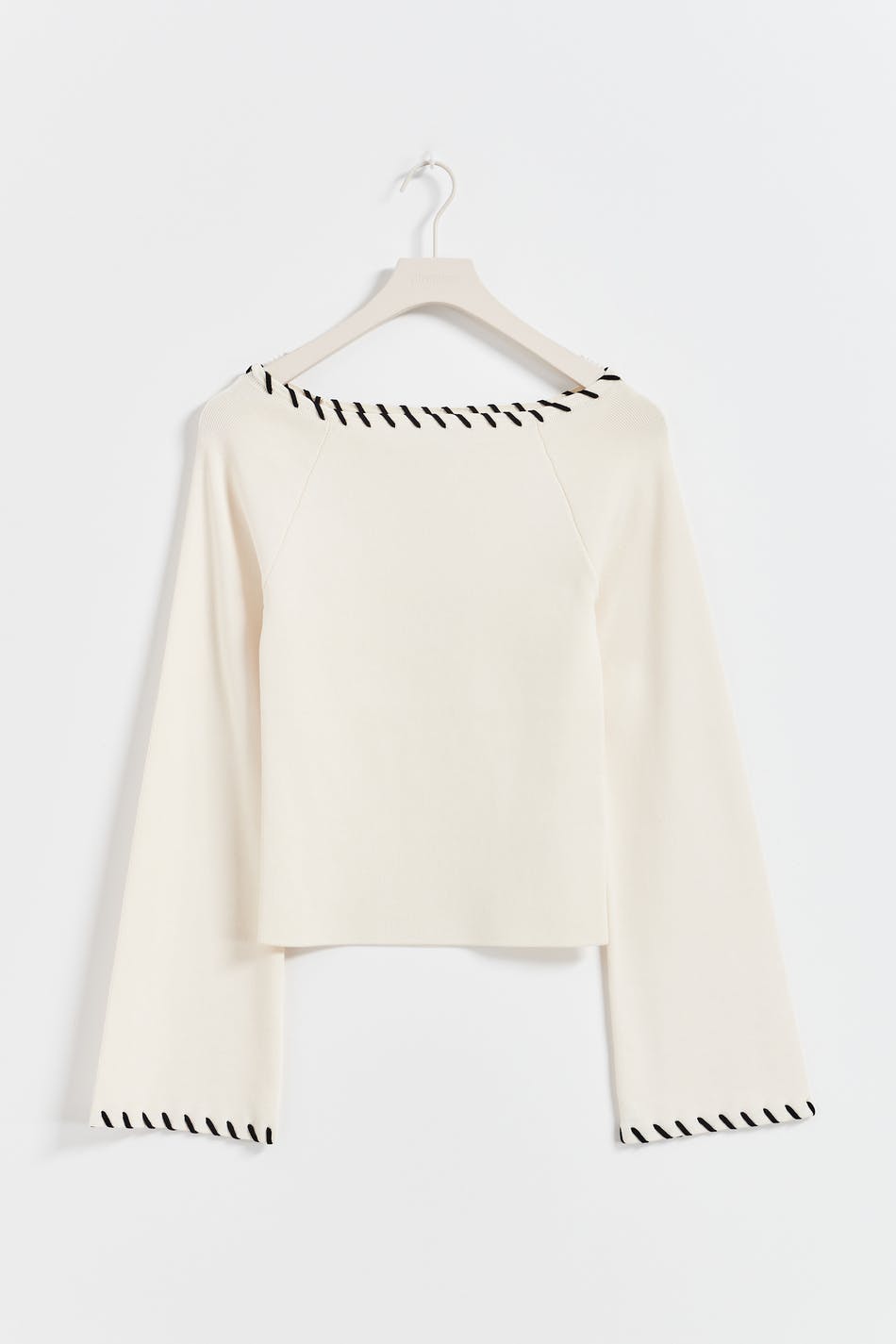 Blanket stitch knit top