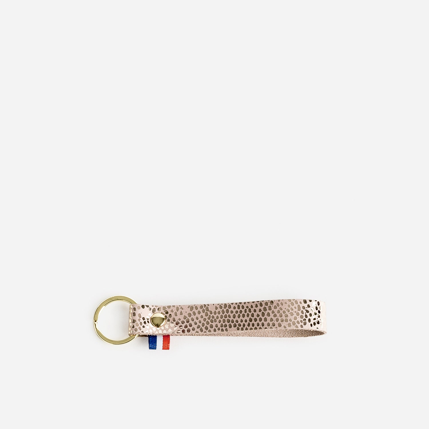 Porte-clés beige et doré en cuir effet pytho
