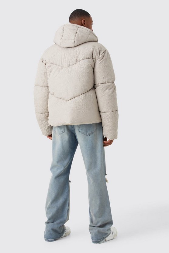Strukturierte Steppjacke in Knitteroptik mit Kapuze