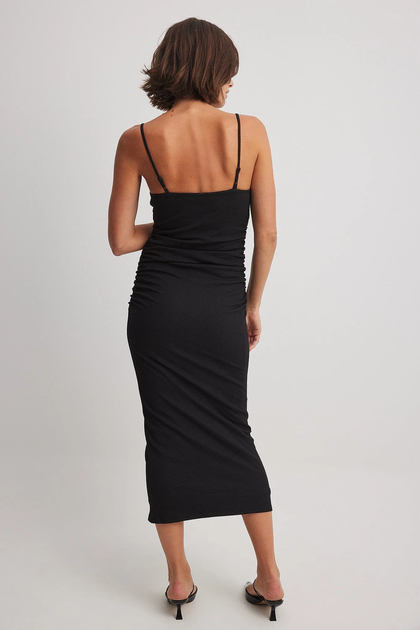 Strukturiertes Kleid mit Seitenschlitz