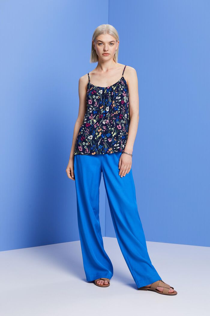 Gemusterte, ärmellose Bluse
