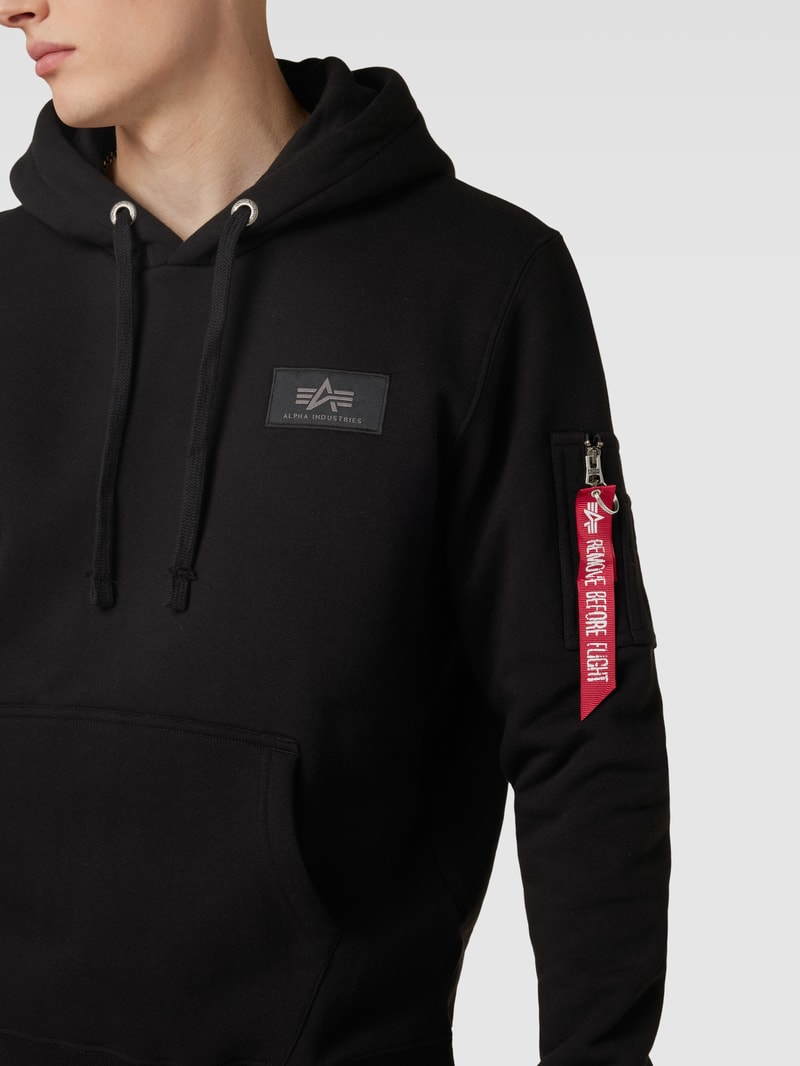 Hoodie mit Label-Applikation Modell 'Camo' in schwarz