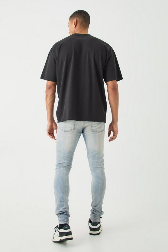 Weiße Skinny Stretch Bikerjeans mit Rissen