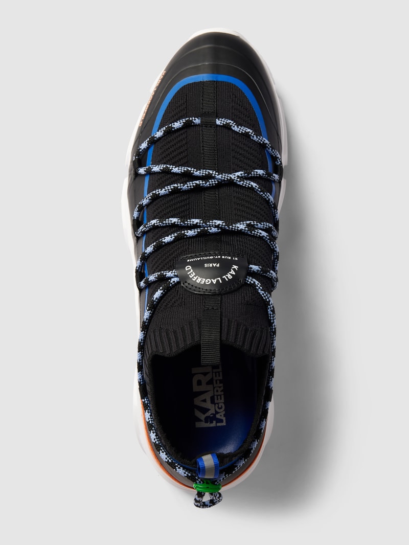 Sneaker mit elastischem Schaft und Schnürung in schwarz