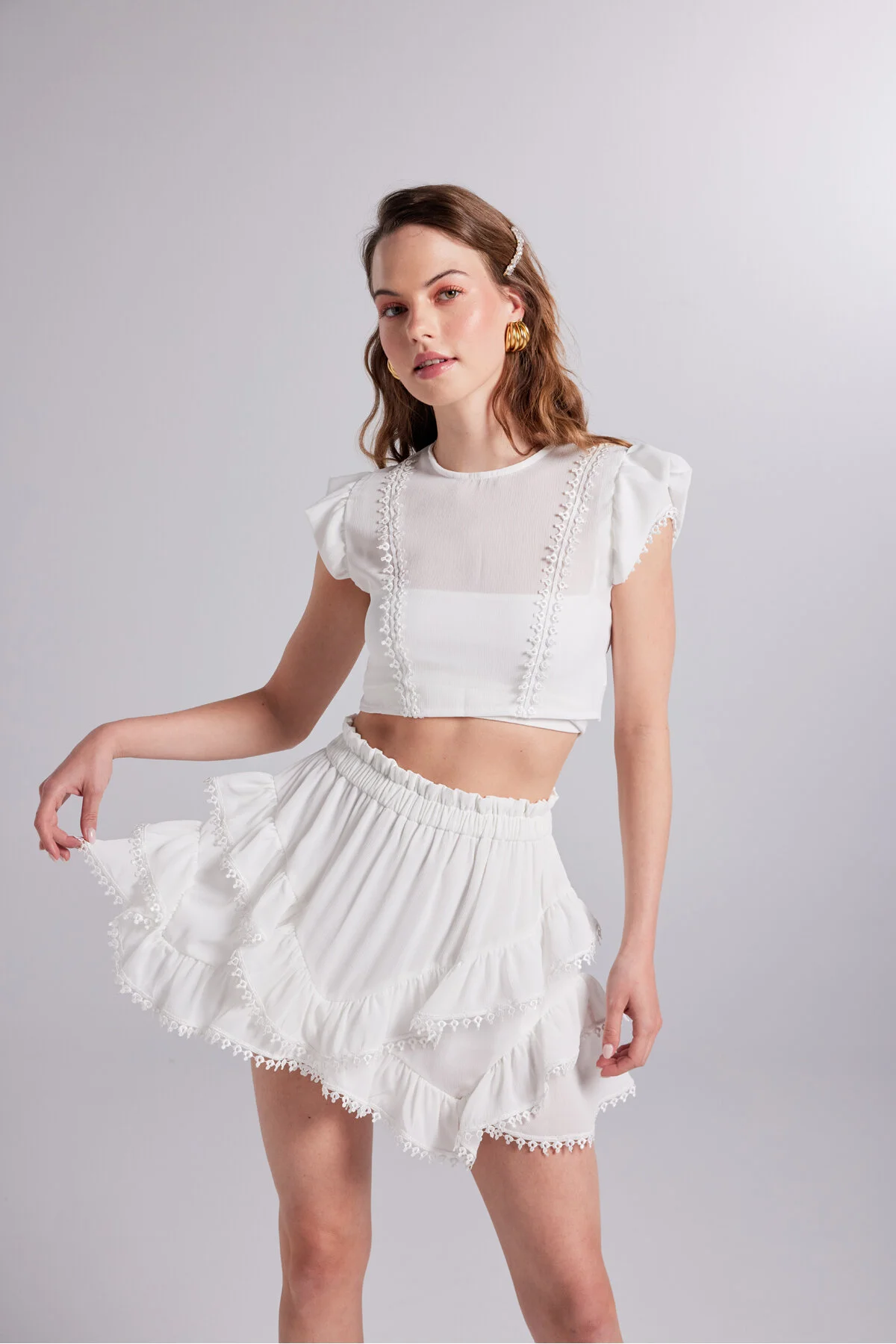 HOLLY LOLLY  Stickerei-detaillierter, asymmetrisch geschnittener, gefütterter Mini-Pixie-Rock in Weiß