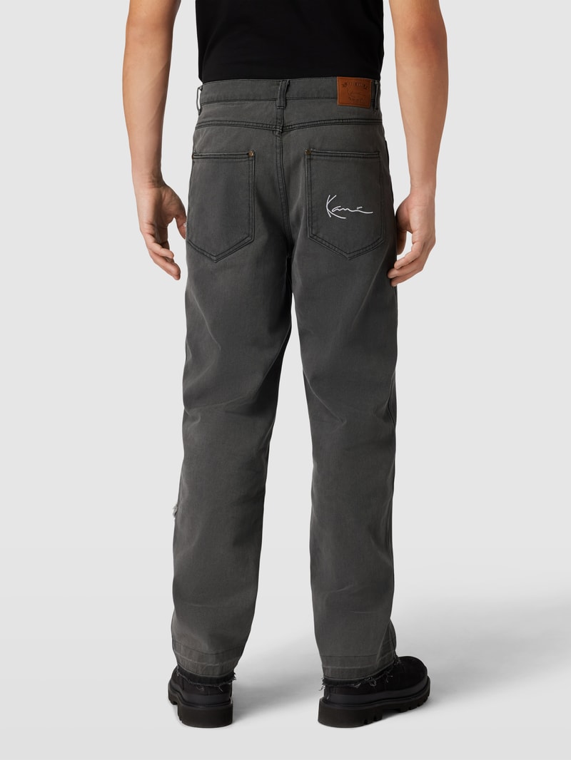 Jeans im Destroyed-Look mit Label-Stitching in black