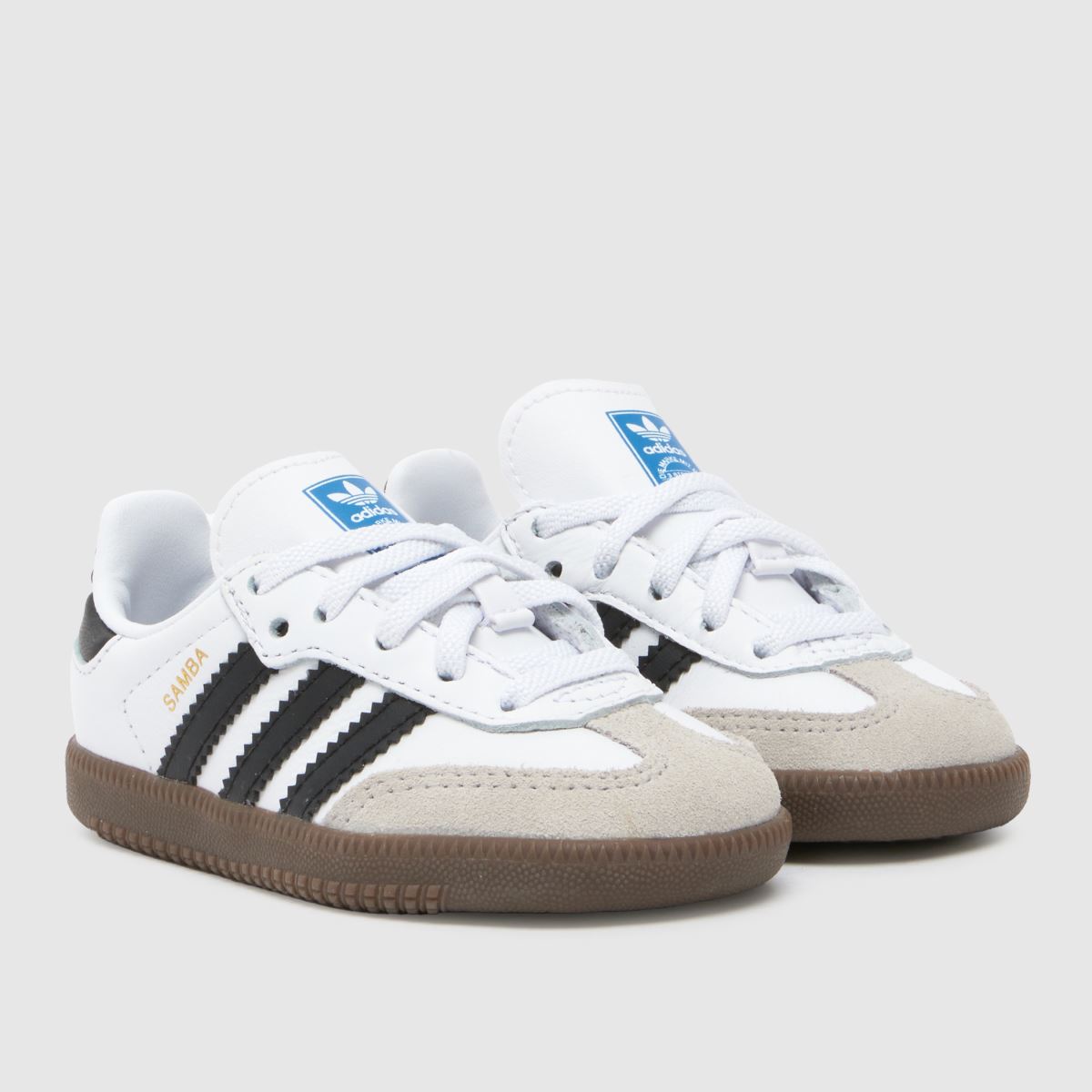 adidas vita och svarta samba och småbarnsskor