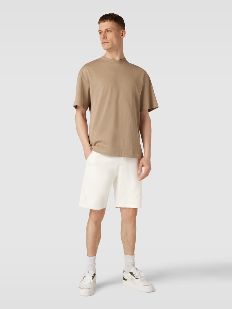 Shorts mit seitlichen Eingrifftaschen in offwhite