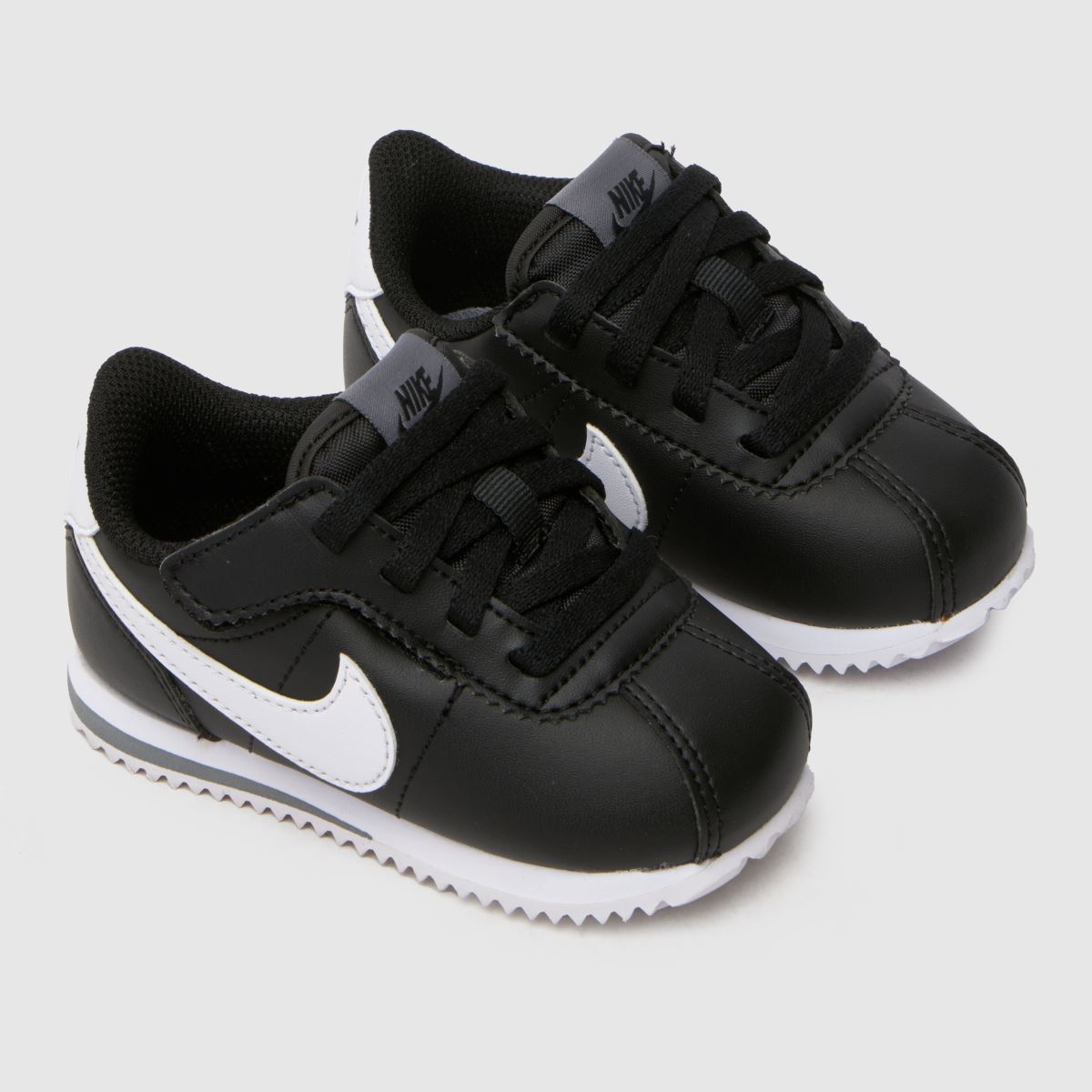 Nike svarta och vita Cortez småbarnsskor