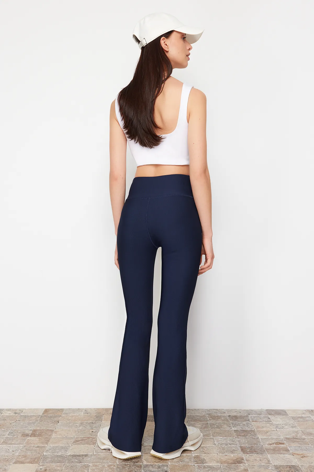 Trendyol Collection  Dunkelmarineblaue gerippte Yoga-Strick-Sportstrumpfhose mit spanischem Bein TWOAW23TY00011