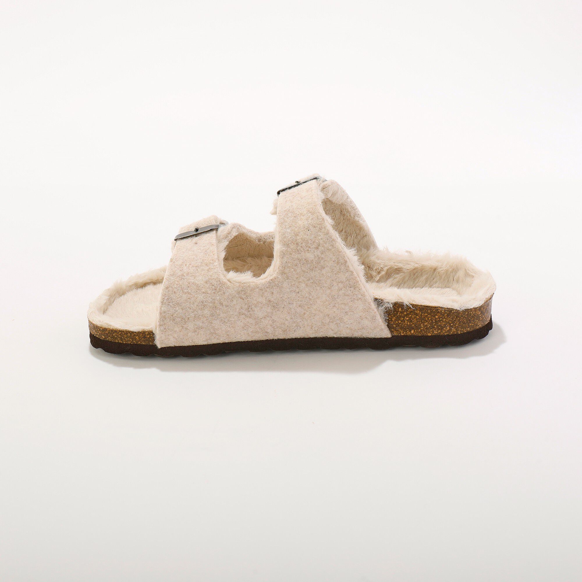 Mules fourrées à boucles