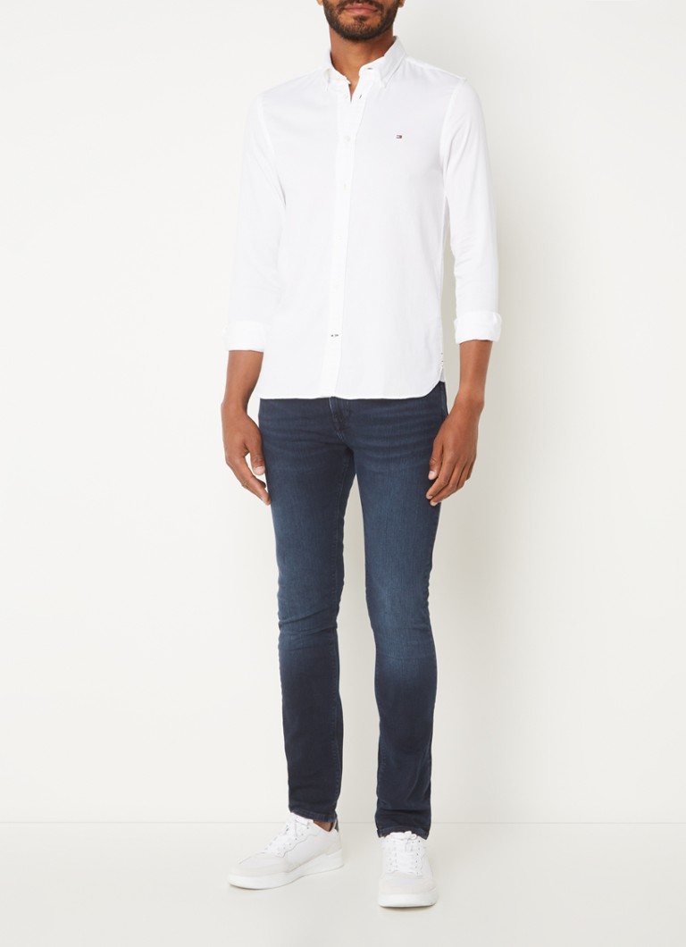 Obcisłe jeansy Tommy Hilfiger Bleecker, w ciemnym odcieniu.